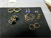7 pairs of gold earrings marked 14K weighs