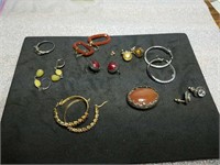 7 pairs of earrings 1 ring 1 broach all marked
