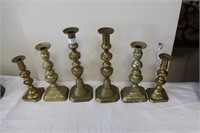 Three pairs of old brass candlesticks