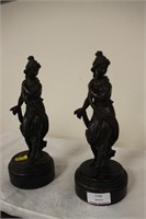 2 bronze figures of ladies.