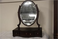 Regency, serpentine shaped dressing table mirror.