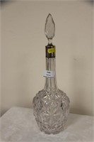 Quality decanter with silver collar.