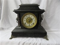 ANTIQUE FIGURAL CLAW FOOTED INGRAM MANTLE CLOCK