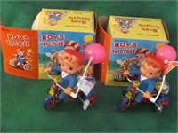 2 BOYS TRICYCLES MADE IN KOREA WINDUP, BOTH WORK