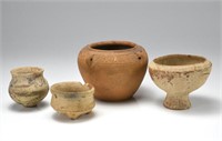Four small pottery jar and vessels