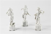 Three Naples Capodimonte porcelain Cupid figures