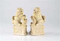 Pair of Chinese white porcelain fu lion sculptures