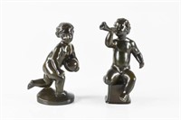 Two Danish Just Andersen figural putti sculptures