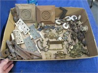flat of various old pulls -rollers -pulls -etc