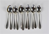 Twelve Arthur Stone silver teaspoons