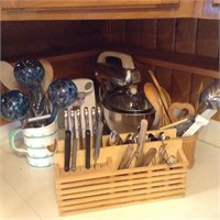 lot of kitchen items on counter as seen