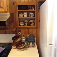 Contents along side kitchen stove as shown