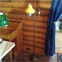 Standing lamp with yellow shade
