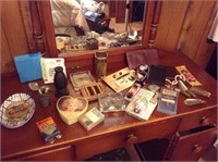 Lot of items as seen on top of dresser