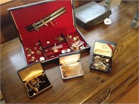 Boxes of cuff links, pins, etc
