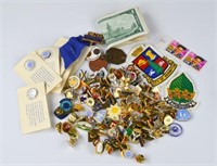 Collection of pins and Canadian banknotes