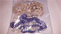 Bag of seashell necklaces