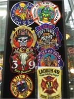 TRAY LOT OF FIREMAN PATCHES