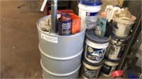 55 gal drum of unused 15w-40 oil and empty oil