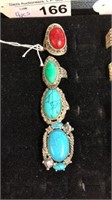 SELECTION OF 4 RINGS WITH TURQUOISE & RED COLORED