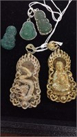 (3) CARVED GREEN GLASS BUDDHA PENDANTS, A CARVED