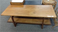 MID CENTURY COFFEE TABLE WITH CANED LOWER SHELF