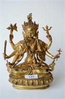 Chinese gilt bronze seated, 8-armed Buddha,