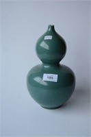 Unusual blue/green glazed vase,