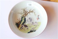 Famille verte shallow bowl, decorated with horse