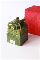 Green stone chop with carved dragon finial