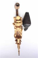 Wooden opium pipe with carved