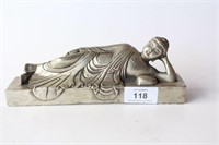 Silver coloured metal figure of reclining