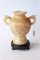 Cream stone double handled urn decorated