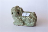 Longquan glazed figure of a Buddhist lion,