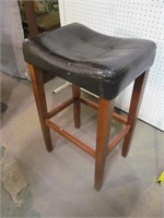 Stool-- feels pushed in somewhat in middle -Wear