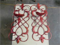 Pair of red metal candle sconces