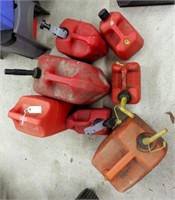(7) gas cans