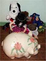Large ceramic piggy bank and stuffed animal
