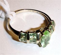 Ladies 14kt gold and emerald dinner ring