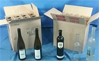 2 boxes of  assorted wine bottles