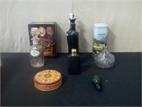 Old liquor bottles and collectible tins