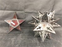 Unique metal hanging star candle holders. Both