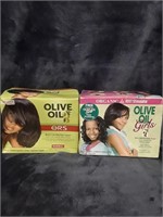 Two boxes of olive oil hair relaxer