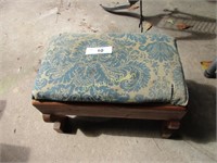 Wooden foot stool with upholstery