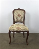 Vintage chair with floral upholstery