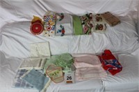 Linens:  (6) Tablecloths (2 w(4) Napkins), &