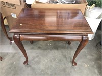 Side table with pullout drawers. Left drawer is