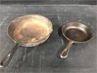 Two cast iron pans-rust present on one