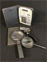 Lot of 2 calculators and magnifying glasses