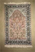 Oriental rug with peasant and lotus design.
